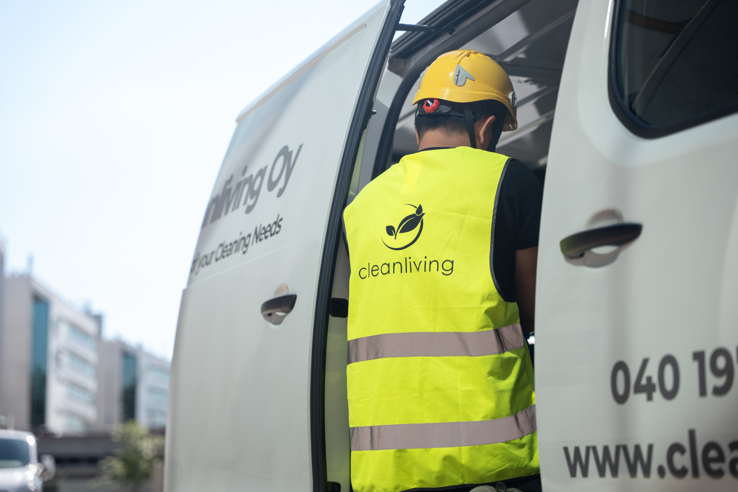 CleanLiving worker at the company van